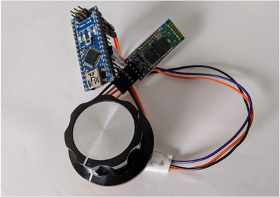 Rotary encoder connected to an Arduino Nano and a Bluetooth module.